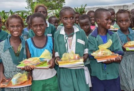 Children receive gifts during message collection