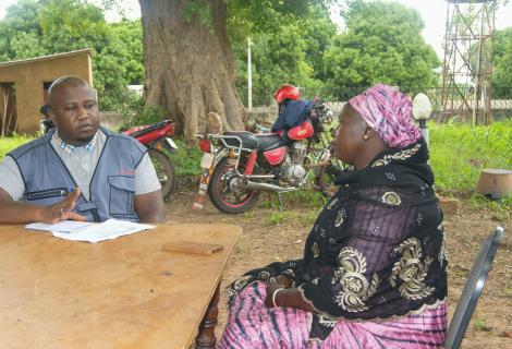 M&E Manager talking to Fatou Manneh, Women's Rep in the District Tribunal