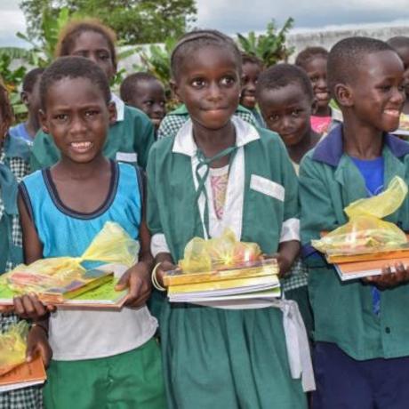 Children receive gifts during message collection